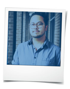 Polaroid-style photo of young Asian man with glasses