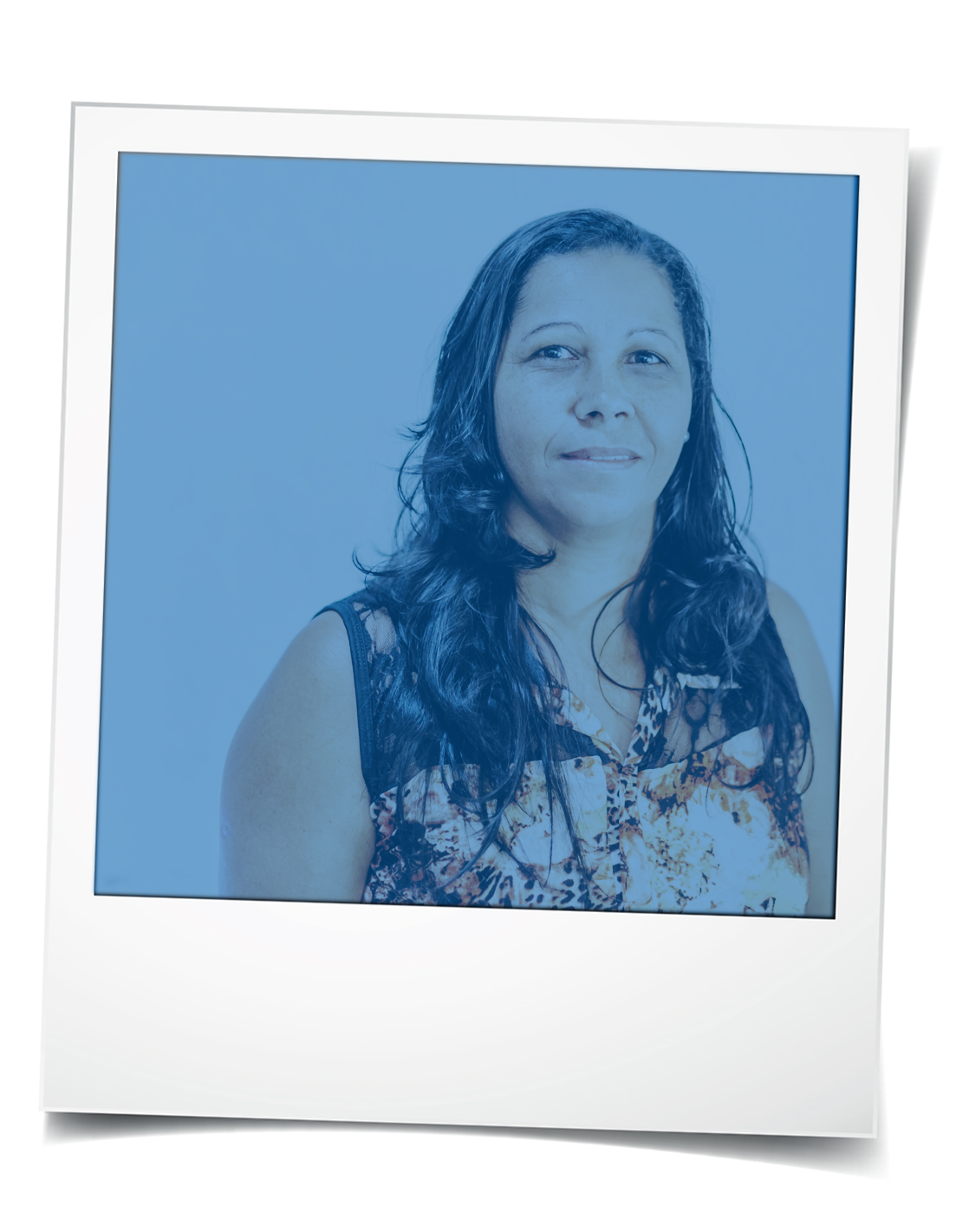 Polaroid-style photo of Latina woman with long hair